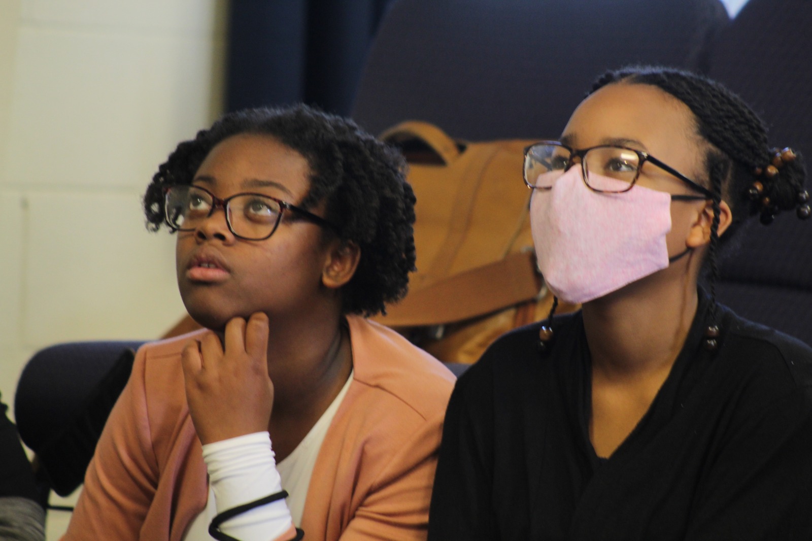 Two Girls listening